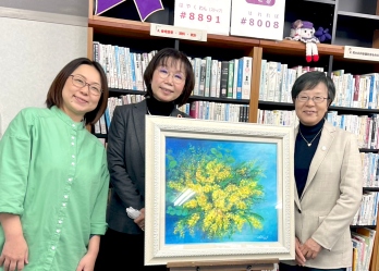原田さん、冨山さんと萩原なつ子が並んで写っている写真