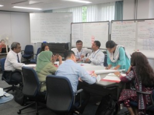 Participants engaged in group discussions
